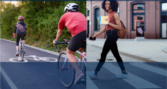 People on bikes and lady crossing on crosswalk