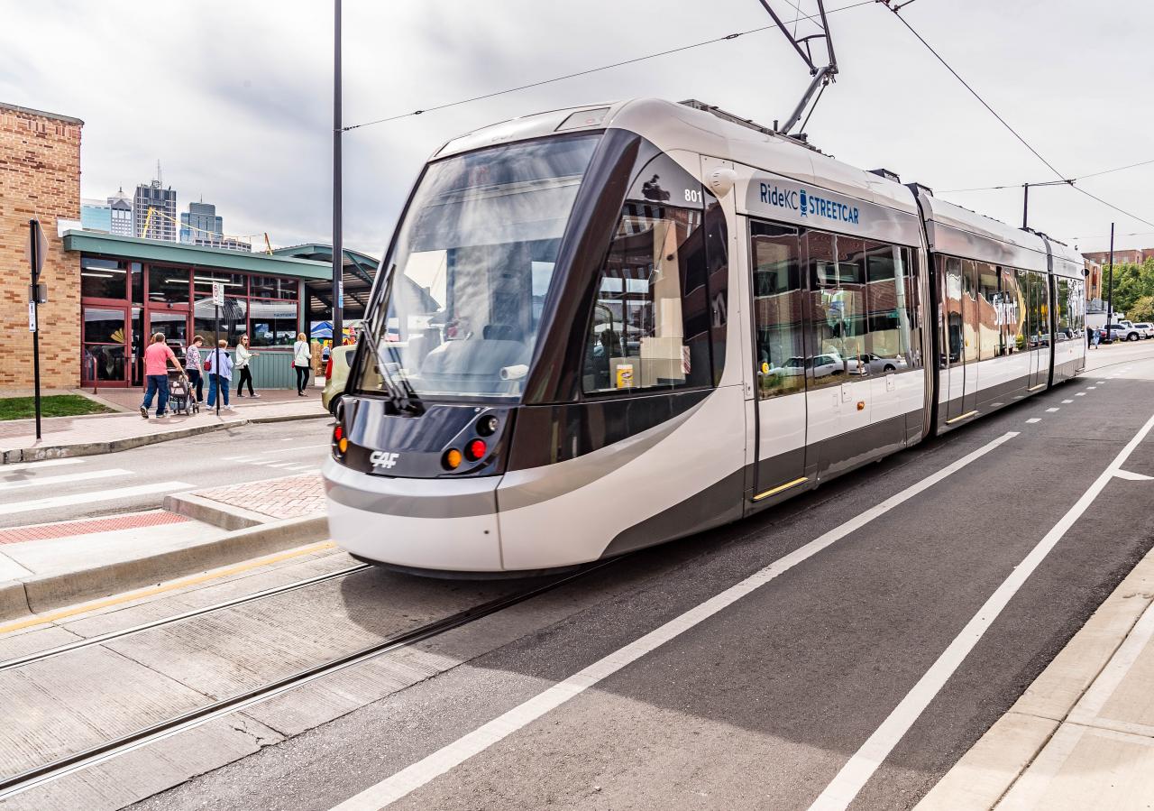 A rendering of a new Kansas City street car shows a street-level train pulled up to a stop