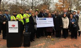 Participants and oversized check at BUILD announcement