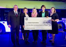 Acting Administrator Jane Williams presents check to Spokane Transit Authority