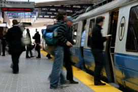 Passengers board an MBTA subway