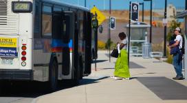 Passengers board bus
